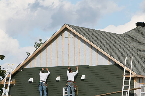 Professional Siding technician working in Railroad, PA